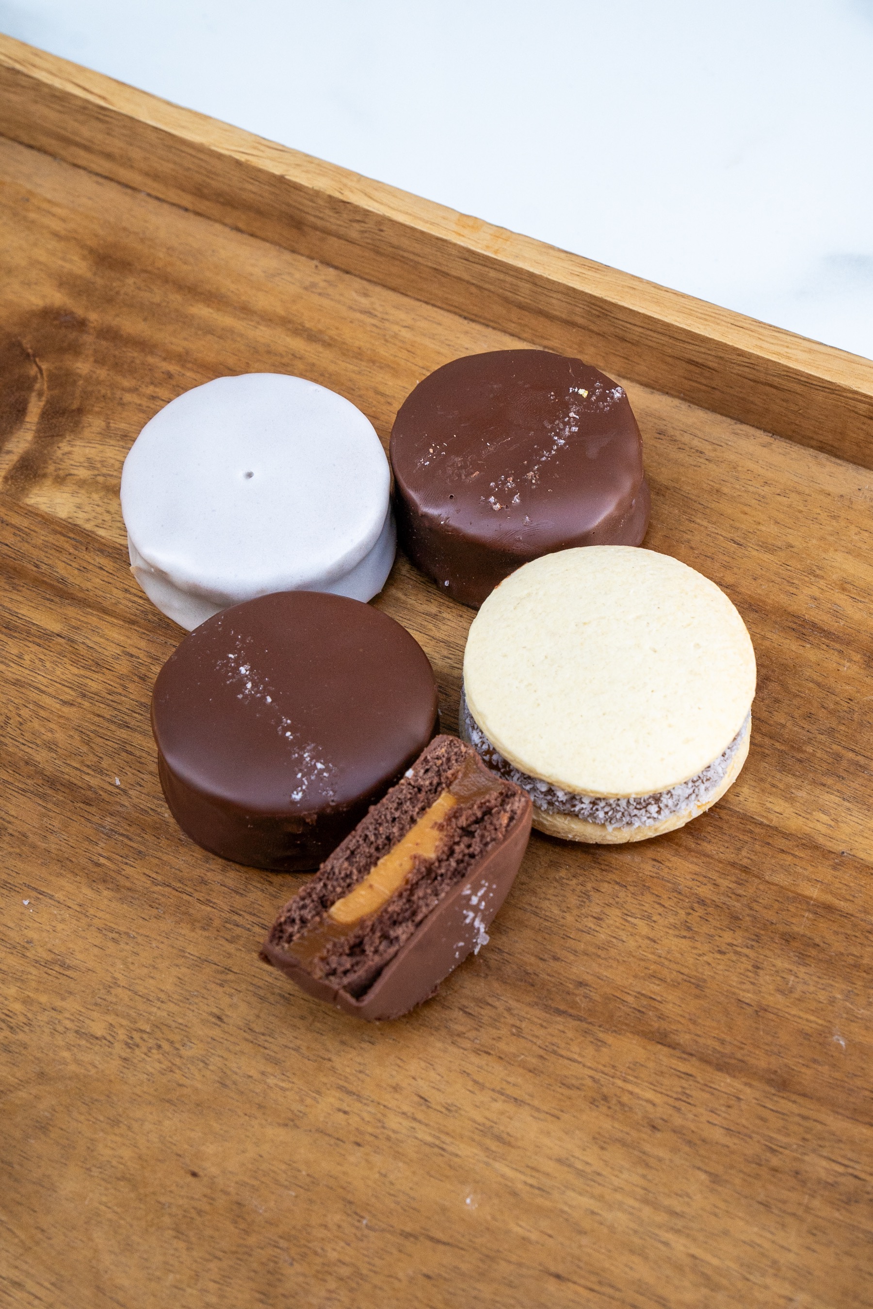 Alfajores cookies on a wooden board